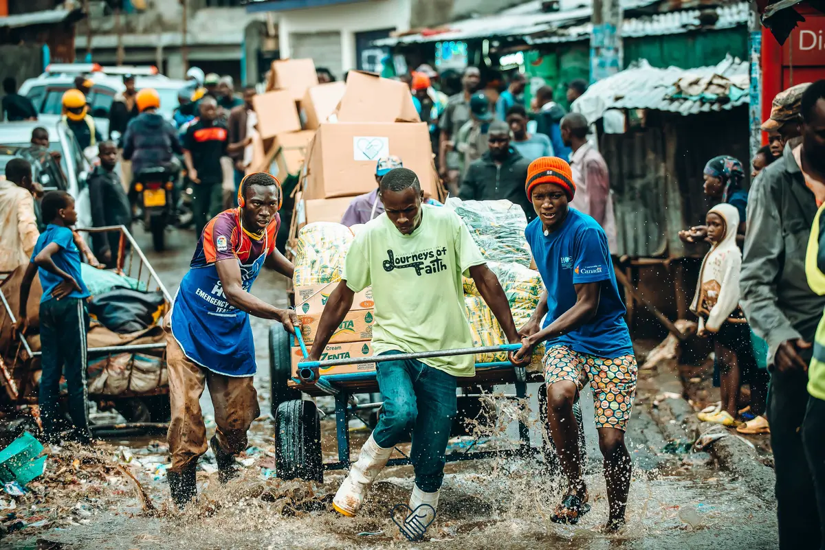 Convoy of Hope rescue team distributing food aid in Mathare Slum during the floods.